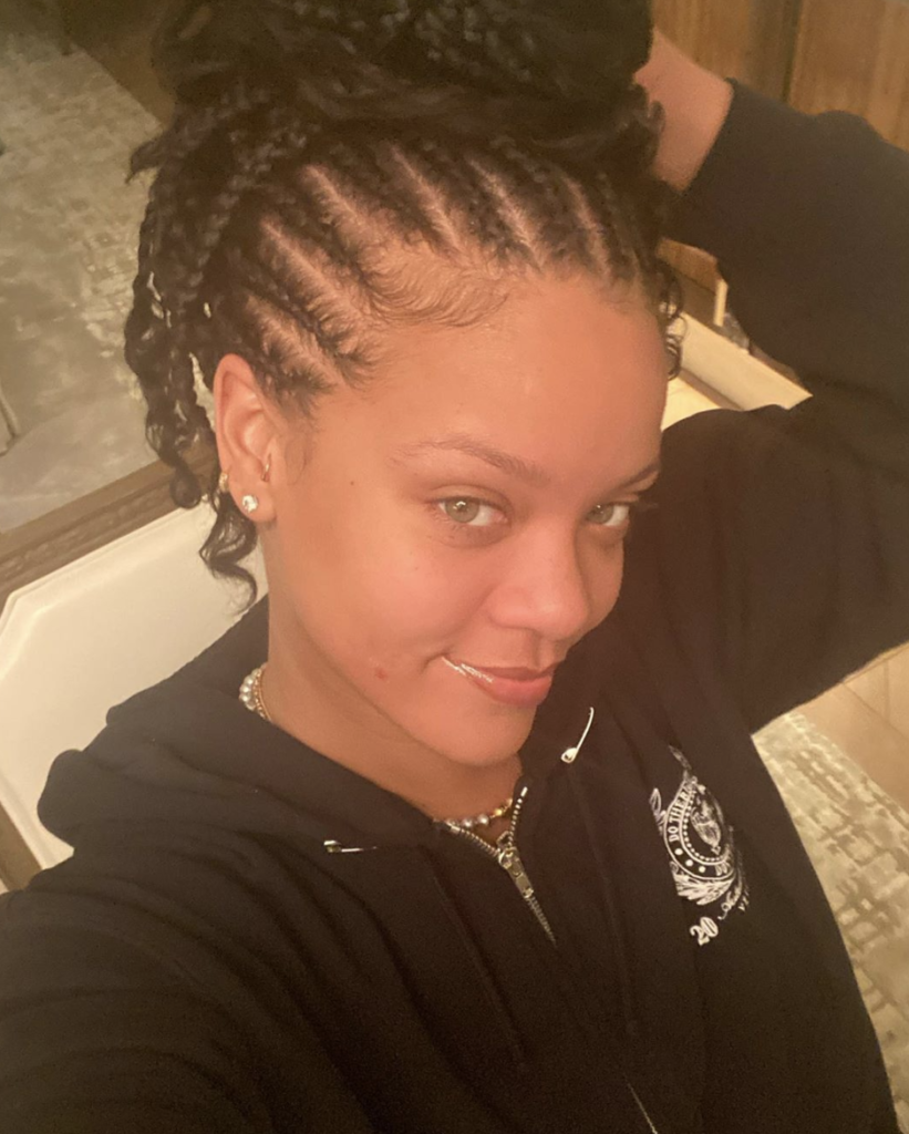 Rihanna no makeup selfie in black hoodie